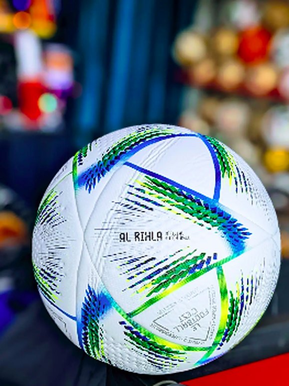 White, green and blue match football