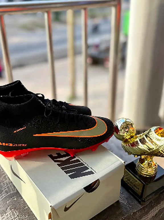 Black and orange high-top boots