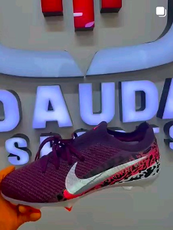 Burgundy leopard-print football boots