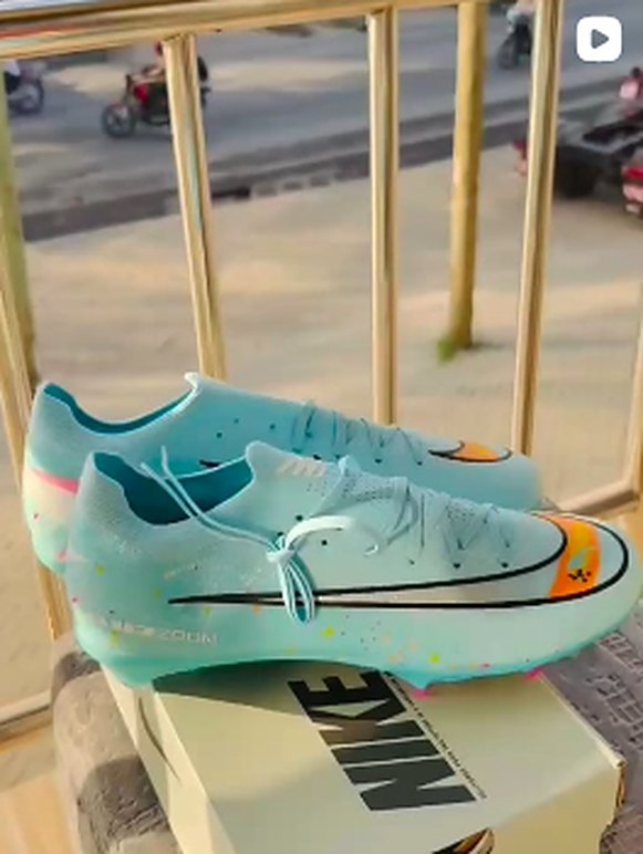 Light blue football boots