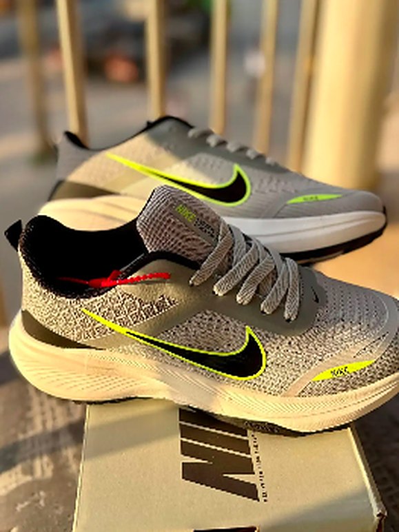 Grey and neon running shoes