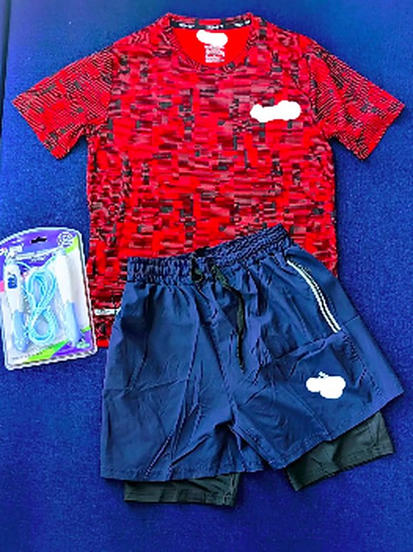 Red training tee and navy shorts set
